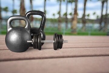 Set of heavy kettlebell and dumbbell, gym concept