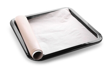 Baking pan with roll of parchment paper isolated on white