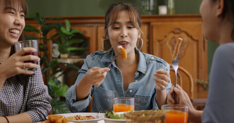 Asia people success young teen girl female group taste tasty buffet dining sit talk or share in youth culture social joy cozy relax leisure dinner hour party guest at reopen indoor casual cafe bar.