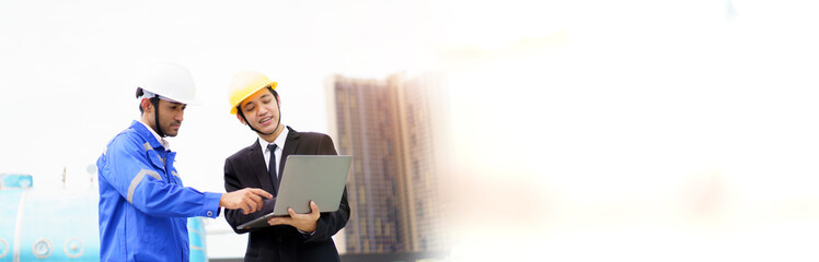 Professional Asian foreman and construction manager talking - discussing about building structure plant.