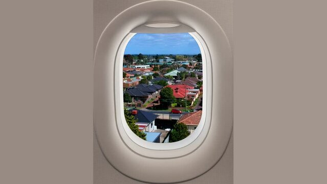 View of Suburban Melbourne Australia from airplane window 