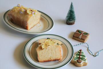 Homemade Lemon cake decorated with cookie for party. Tasty dessert for winter holidays. Merry Christmas and Happy New Year atmosphere.