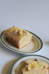 Homemade Lemon cake decorated with cookie for party. Tasty dessert for winter holidays. Merry Christmas and Happy New Year atmosphere.