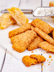 Cheese cookies on wooden rustic table. Close up