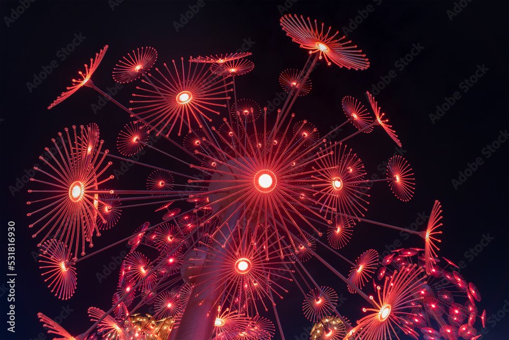 Poster abstract neon glowing flower. bright sparkling background. psychedelic background