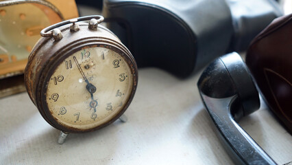 Brown vintage old desk clock. Focus selected