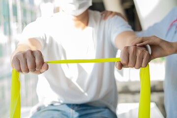 Physical therapy patients. Hold the patient's hand to treat the shoulder joint. doctor consulting patient About the problem of shoulder muscle pain, concepts, diagnosis