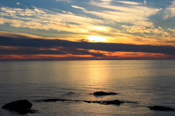 Fototapeta na wymiar 夕陽に輝く海 