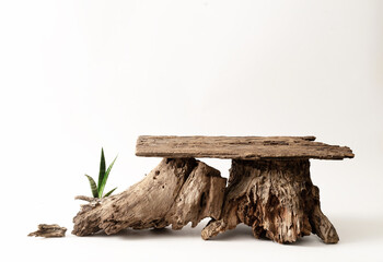 Wood product display podium with nature green leaves for presentation design