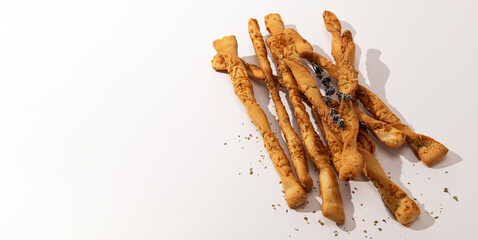 Grissini, bread sticks on a white background, banner, place for text