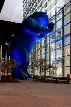 Denver, Colorado, USA - 4.2022 - Large Blue Bear artwork statue outside the Colorado Convention Center.