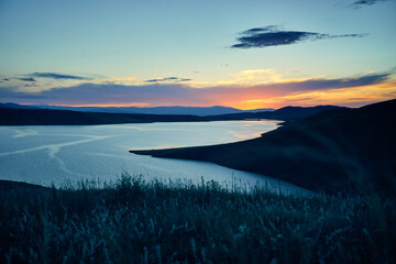 Landscape of beautiful Mountain Lake at sunset