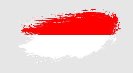 Free hand drawn grunge flag of Indonesia on isolated white background