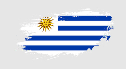Fototapeta premium Free hand drawn grunge flag of Uruguay on isolated white background