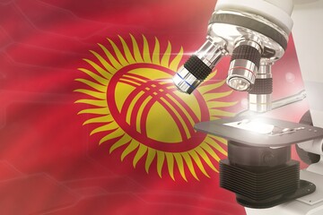 Kyrgyzstan science development concept - microscope on flag background. Research in pharmaceutical industry or biology 3D illustration of object