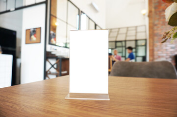 Wenu frame standing on wood table in  Bar restaurant cafe. Space for text marketing promotion.  © Wanda