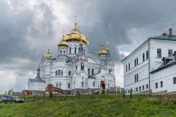 Belogorsky Monastery (Perm region, Russia) in summer. A majestic white-stone temple