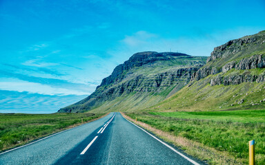 Beautiful road across Iceland countryside in summer