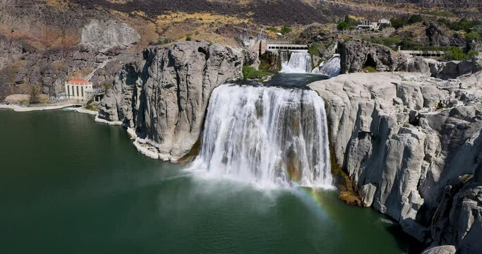 Snake River Waterfall rainbow Twin Falls Idaho 60 fps. Shoshone Falls waterfall on the Snake River, Idaho. Irrigation and hydroelectric power stations is economic impact to west.