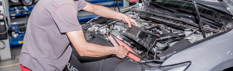 Auto service. The master performs maintenance, oil change, computer diagnostics, replacement of auto parts, repair of the brake system. Modern universal car service.