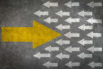 Courage, opposition, uniqueness and individuality concept. Big yellow arrow changing direction...