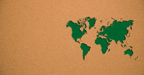 Green papercut world map on recycled paper. reuse of resources will save planet earth from...
