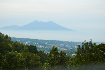 Fototapeta premium Puncak Pass, Bogor, Indonesia – Novemer 22, 2020, With Blured Background, Light Bokeh Background.