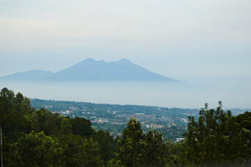 Naklejka premium Puncak Pass, Bogor, Indonesia – Novemer 22, 2020, With Blured Background, Light Bokeh Background.