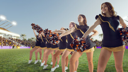 Group of cheerleaders in action on  stadium