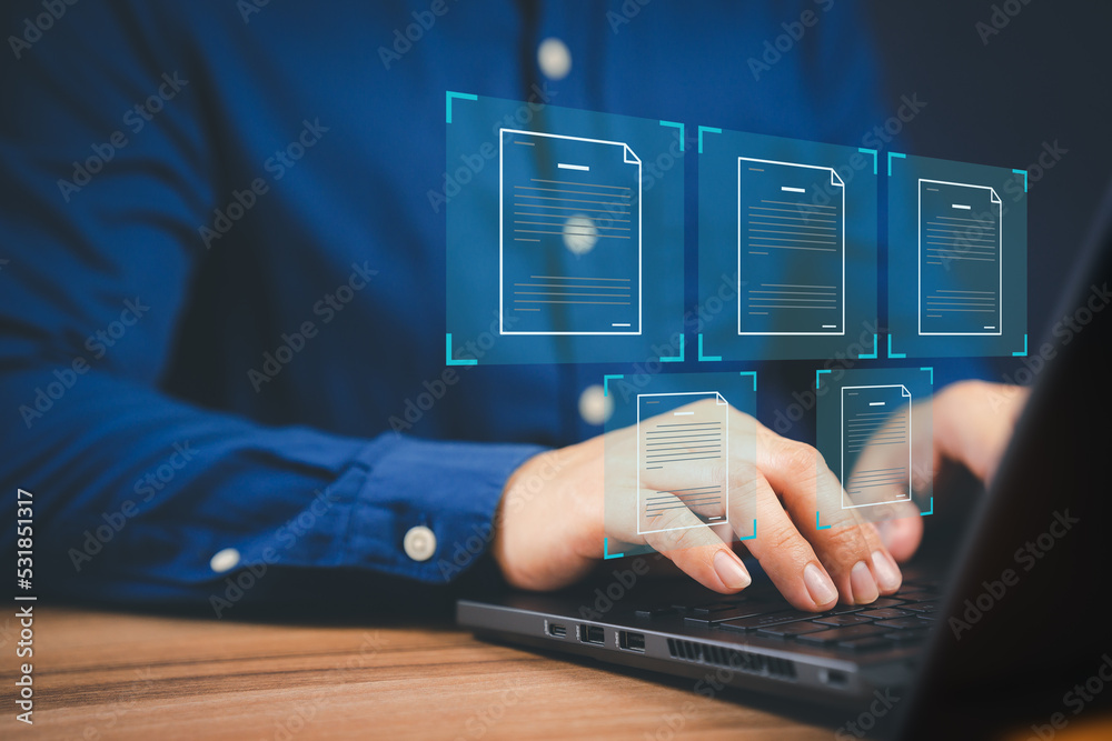 Poster Businessmen use laptop computer with virtual screens and documents to approve paperless quality assurance concepts online.
