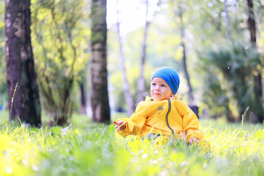 child flowers raincoat walk, seasonal spring autumn kid in waterproof clothes