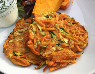 Grated zucchini and pumkpin mashed together and fried as patties