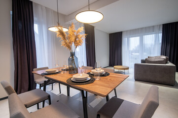 Dining area and lounge in a contemporary studio apartment