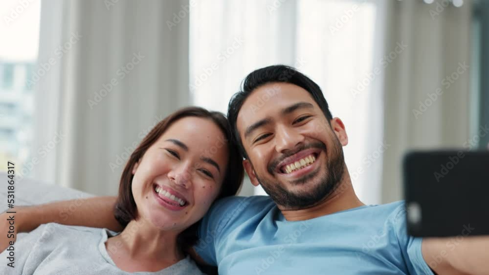 Sticker Couple selfie, phone smile and relax on the sofa in home, happy with mobile app on technology and love in marriage with smartphone. Asian man and woman with photo for social media with tech on couch