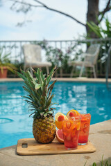 fruit cocktails by the pool
