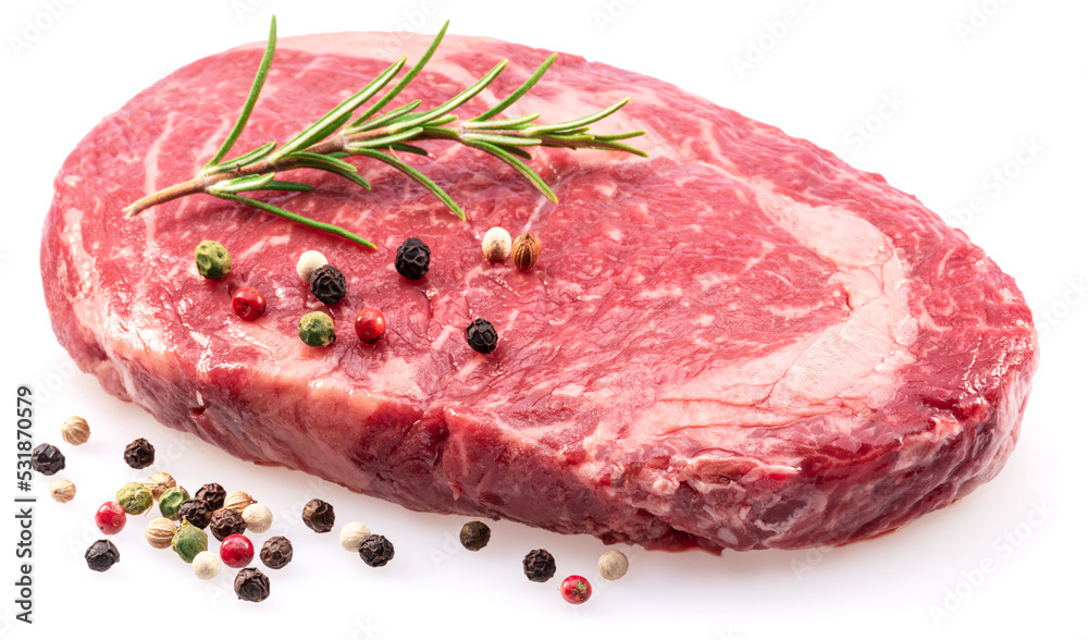 Wall mural ribeye steak with peppercorn and rosemary isolated on white background. top view.