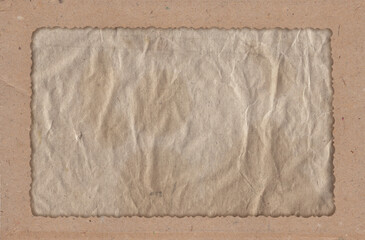 Old vintage rough crumpled paper with scratches and stains texture