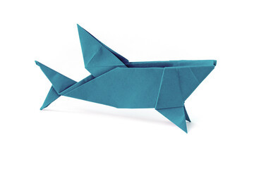 Blue paper shark origami isolated on a white background