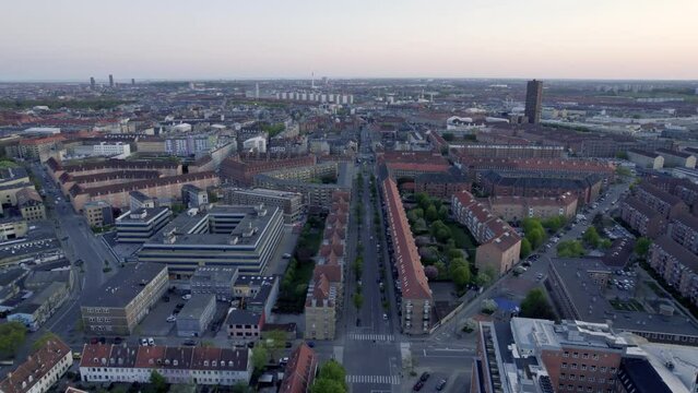 Drone flies along quiet road in Copenhagen, spring evening, Denmark prt 1