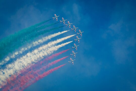 Freccie Tricolori rolling in the blue sky