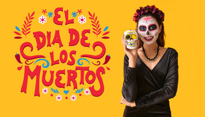 Young woman with painted face and sugar skull for Mexico's Day of the Dead (El Dia de Muertos) on yellow background
