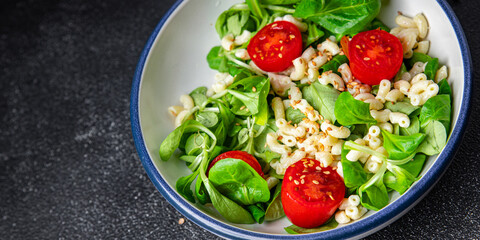 pasta salad tomato, vegetables second course healthy meal food snack diet on the table copy space food background rustic top view keto or paleo diet veggie vegan or vegetarian food