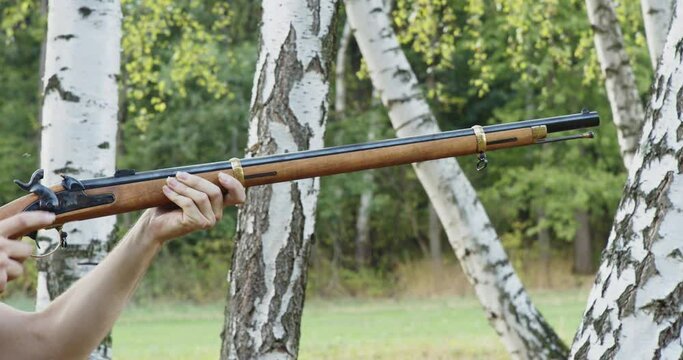Side view of a shot from an old historical rifle.