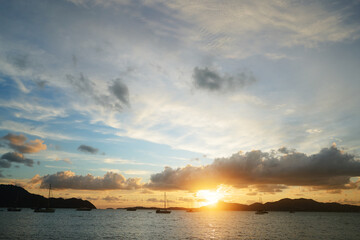 Beautiful seascape with sunset cloudy sky.