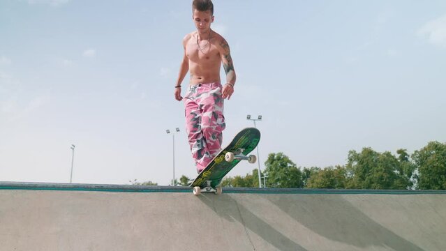Play preview video
Download Preview 
 Add to Favorites
 Add to Collection
A young skateboarder rides a skateboard in the park on the railing and on the mountains on the concrete. Jumps over obstacles 