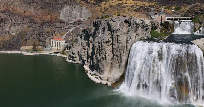 Twin Falls Idaho Snake River Waterfall 60 fps pan. Waterfall on the Snake River, Idaho. Irrigation and hydroelectric power stations is economic impact to west. higher than Niagara Falls. Travel.