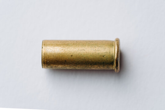Pistol bullet casings isolated on white background, top view