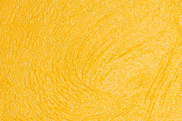 Yellow plaster wall texture background.
