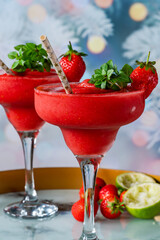 Frozen strawberry daiquiri with white rum garnished with fresh fruit