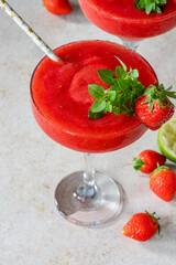 Frozen strawberry daiquiri with white rum garnished with fresh fruit